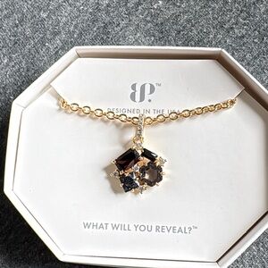 Elegant Gold and Black Gemstone Necklace
